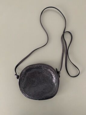 HOLT RENFREW PRIVATE LABEL Black Round Crossbody Bag - Sleek Perforated Design